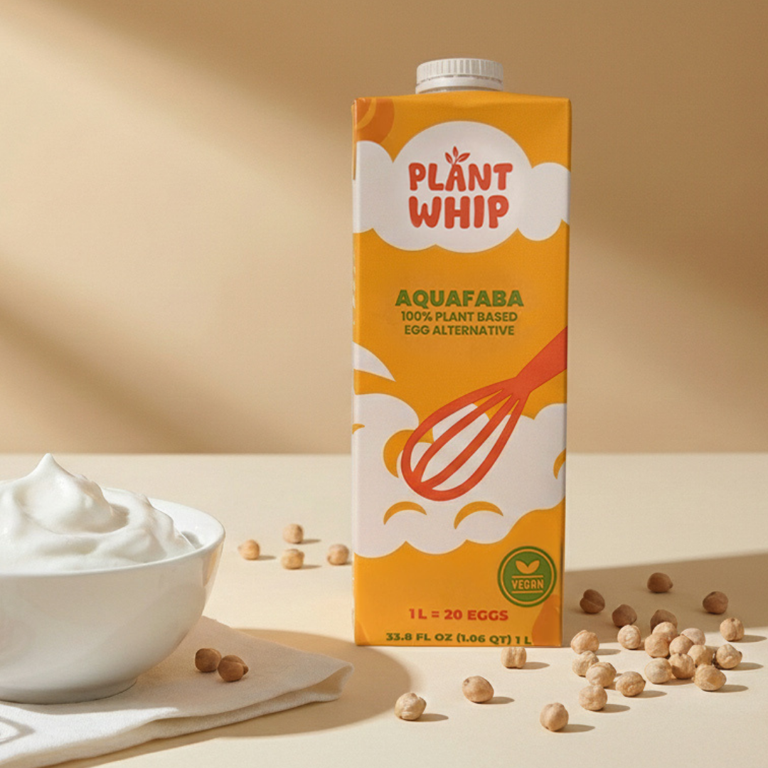 Product shot of plant-based liquid aquafaba carton with ingredients on a neutral background